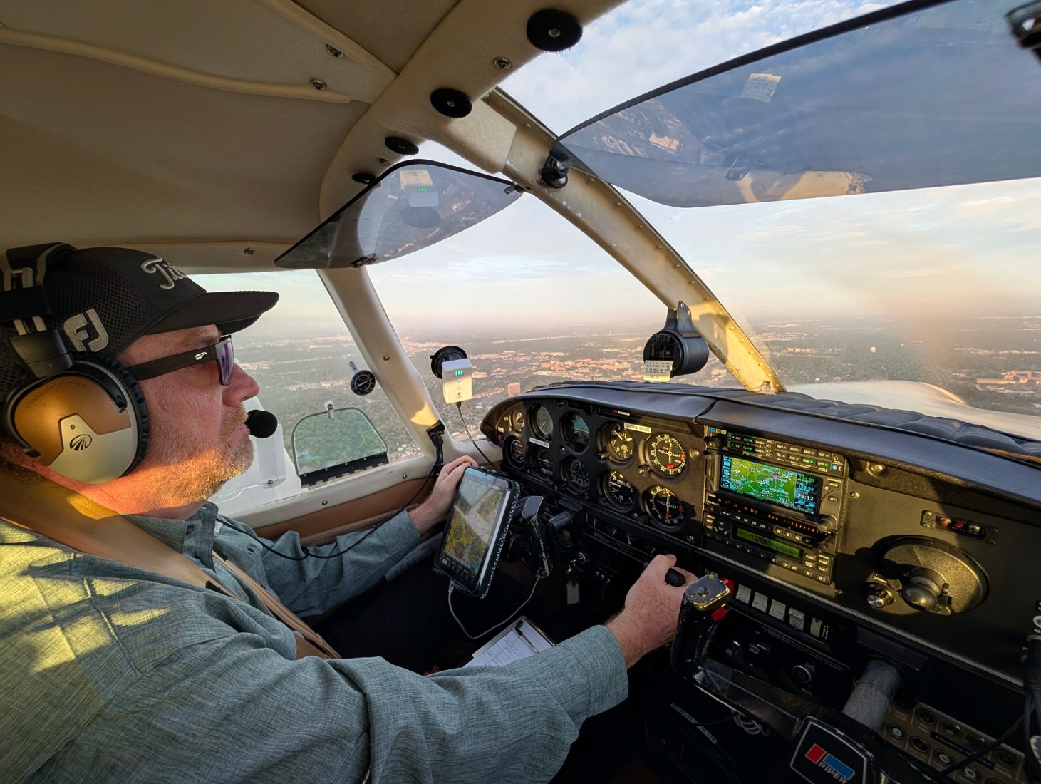 Anthony flying his Piper Cherokee, with the cockpit and horizon in view